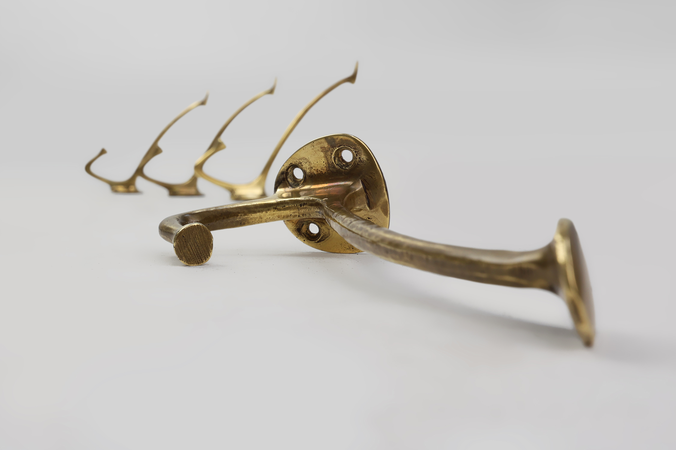 Set of 4 Adolf Loos brass art nouveau wall hooks, Vienna, Austria ca. 1910thumbnail
